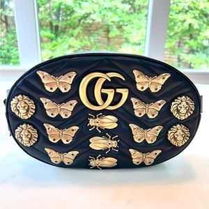 Gucci Matmont calfskin belt bag with bug and lion studs.
